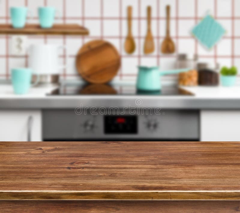 Wooden texture table on defocused modern kitchen background stock photography Wooden texture table on defocused modern kitchen background stock photography
