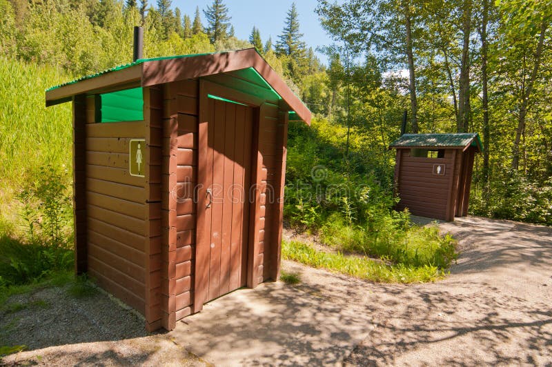 Wooden toilet huts royalty free stock photos