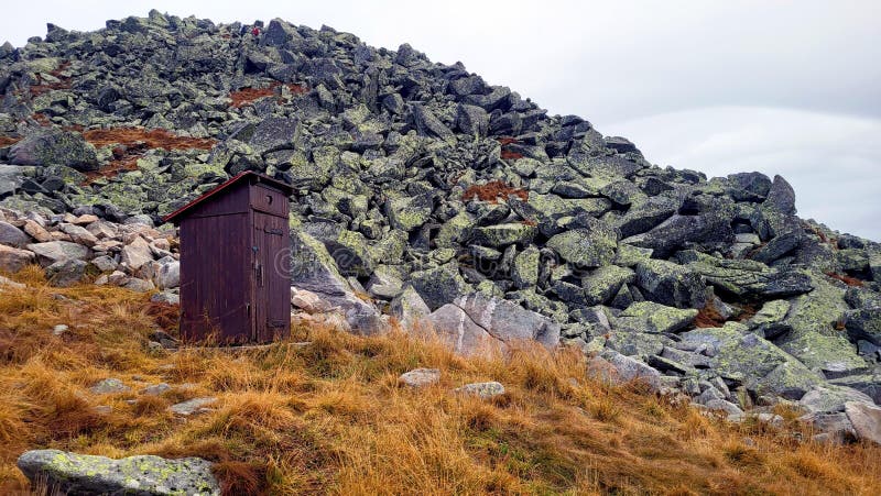 Wooden toilet in the mountains