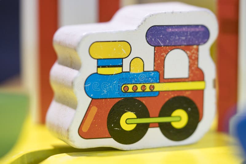 wooden toy train - Play set Educational toys for preschool indoor playground (selective focus) stock images wooden toy train - Play set Educational toys for preschool indoor playground (selective focus) stock images