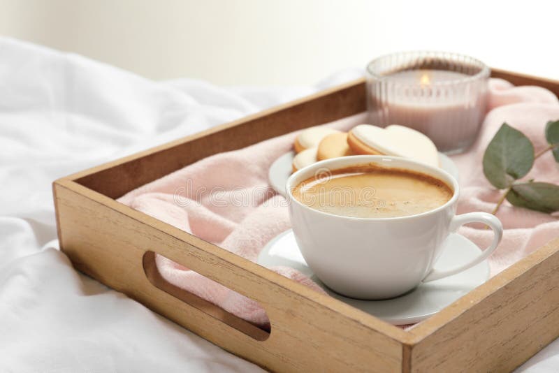 Wooden Tray with Coffee and on Bed. Romantic Breakfast Stock Image