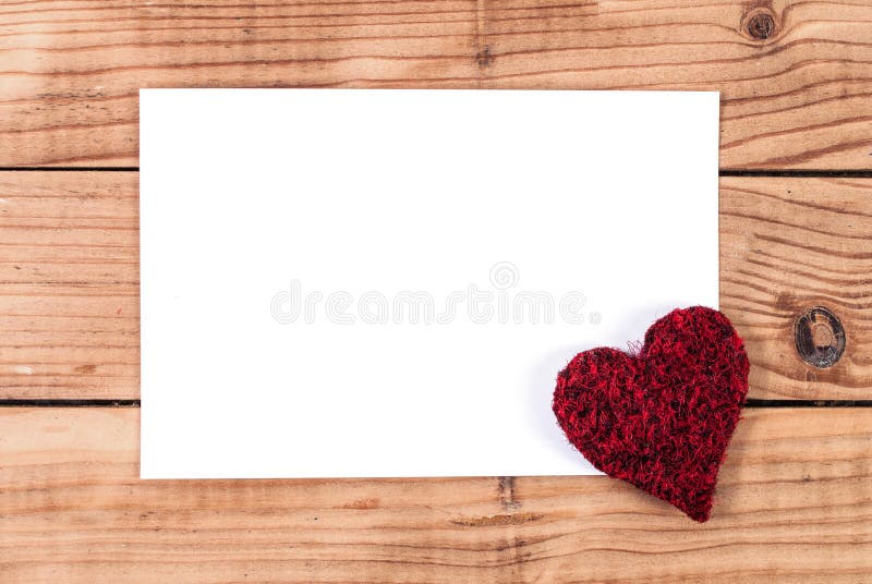 Love Frame: Blank White Paper on Wooden Background with Heart Detail