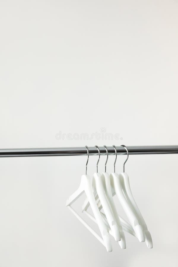 Hangers with Baby Clothes on Rack Stock Photo - Image of garments, inside:  132793586