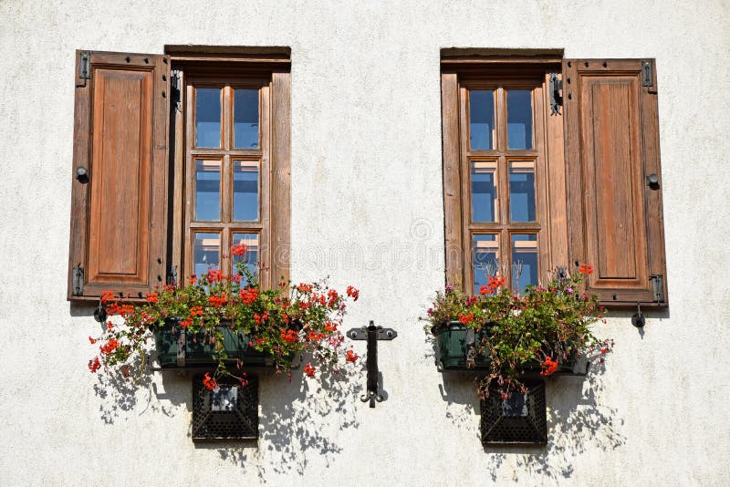 Wooden window frames and flowers royalty free stock photo