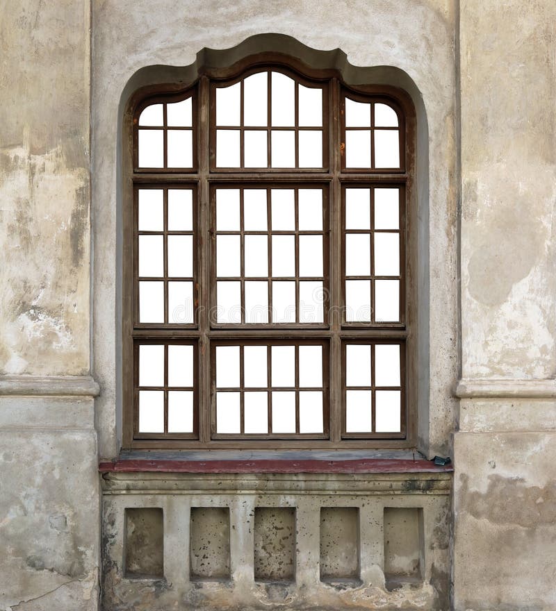 The wooden window of the old destroyed church