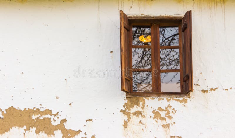 Wooden window on wall