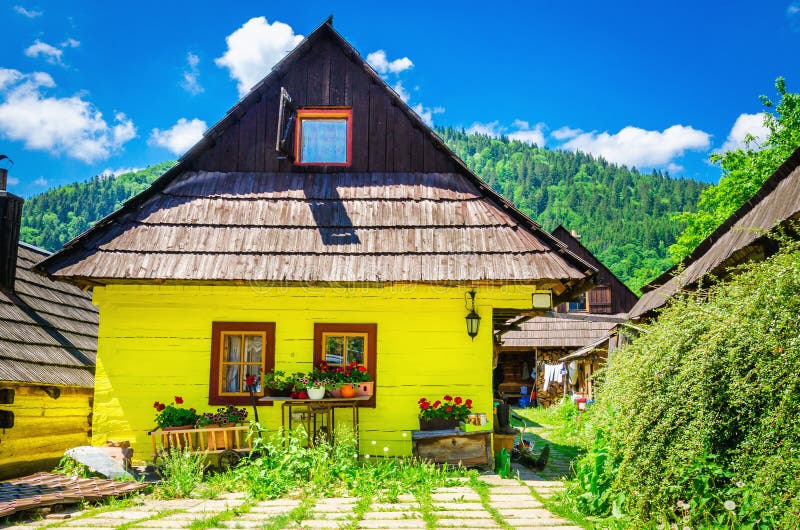 Wooden yellow hut in traditional village, Slovakia