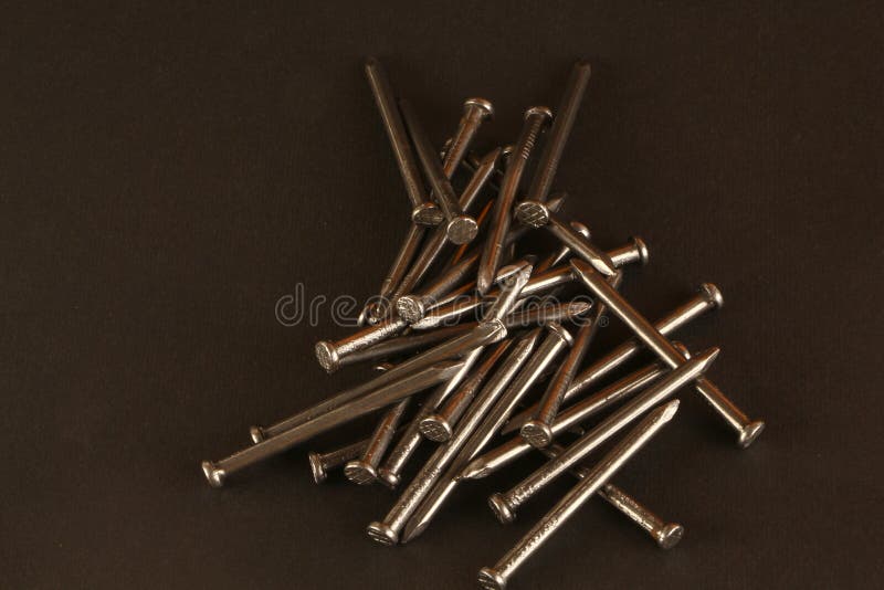 Metallic Iron Nails in Black Background Stock Photo - Image of industrial, connecticut: 156113044 Metallic Iron Nails in Black Background Stock Photo - Image of industrial, connecticut: 156113044