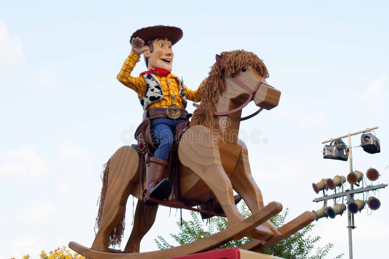 Woody from Toy Story on a rocking horse on float in Disneyland Parade