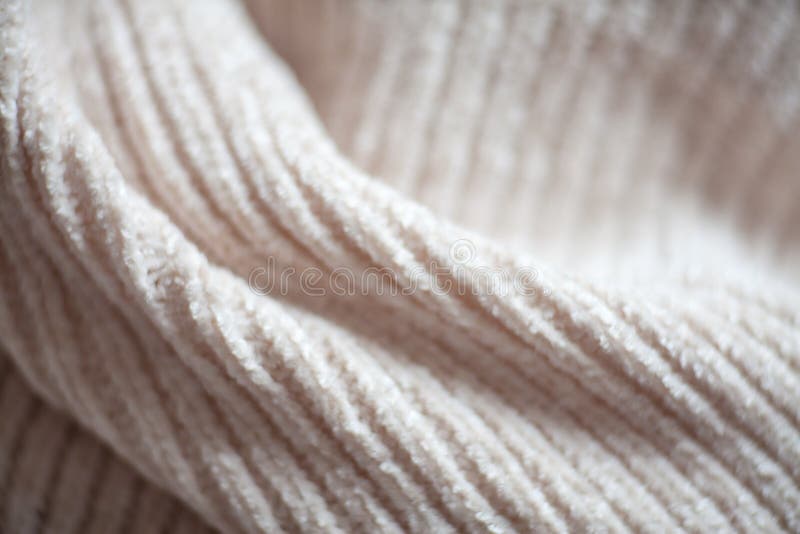 Closeup Macro Texture Of Knitted Wool Fabric, Clothing Background With  Wrinkles And Folds Stock Photo, Picture and Royalty Free Image. Image  36232075.