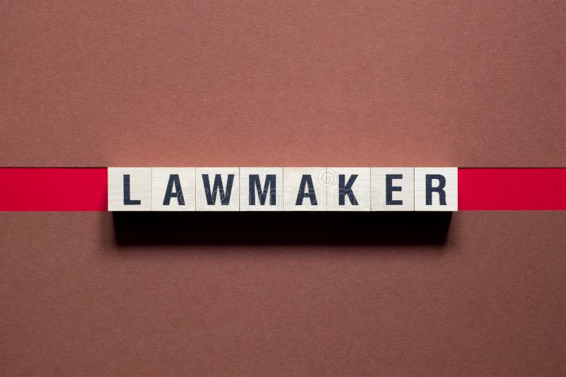 Concept van het woord van een wetgever op kubussen stock foto's