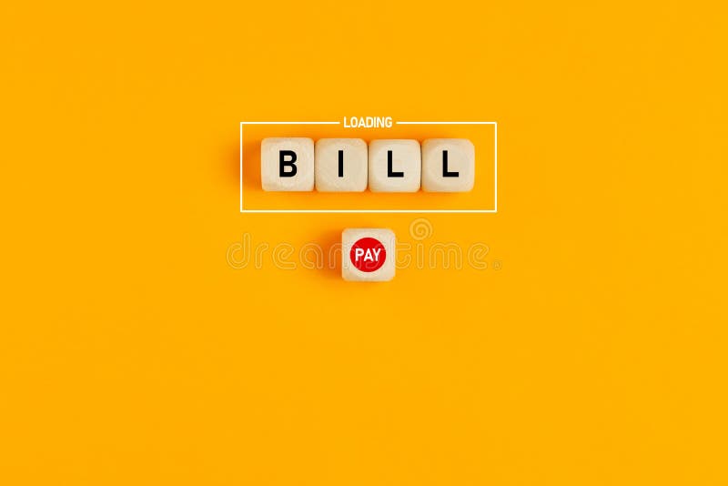 The word bill loading written on wood blocks with a push payment button. Concept of online bill payment in business or finance