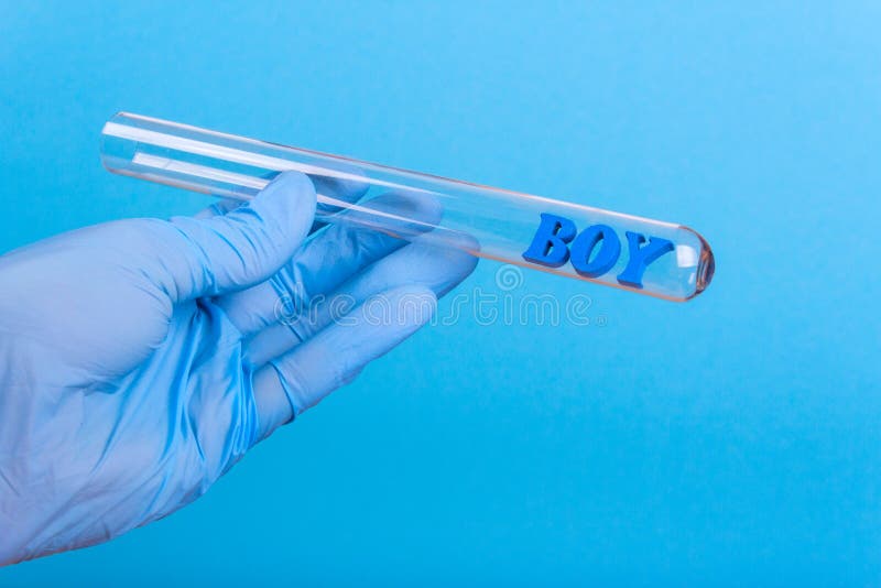 Word boy in test-tube holding a gloved hand