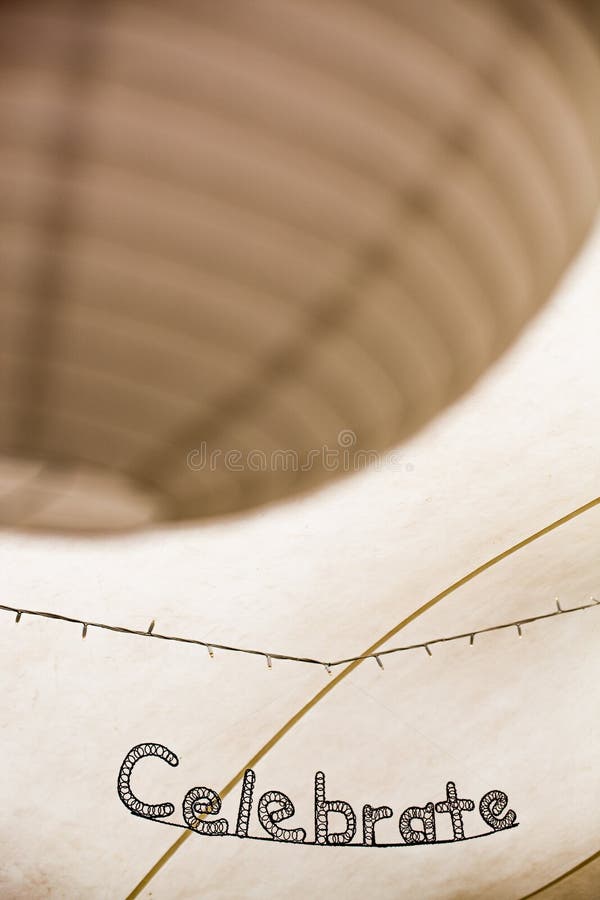 The word celebrate in bent metal artwork with paper light shades royalty free stock photos The word celebrate in bent metal artwork with paper light shades royalty free stock photos
