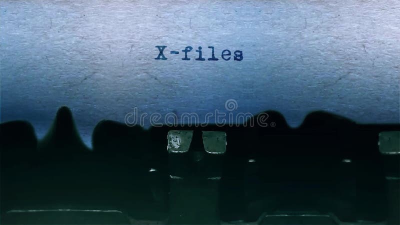 X-files Word Typing Centered on a Sheet of paper on old Typewriter audio.