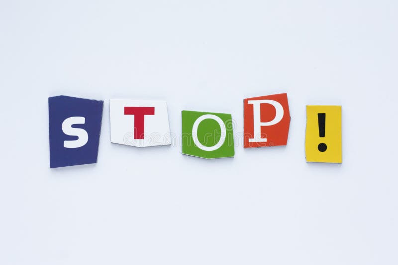 Word from cut letters STOP on white background. A word writing text showing STOP! Concept of the ban. White paper texture. stock photos