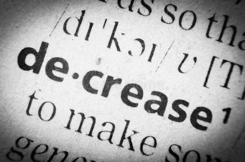Word decrease, glossary, macro. The word decrease in English glossary, super macro. Word decrease stock images, royalty-free photos and pictures