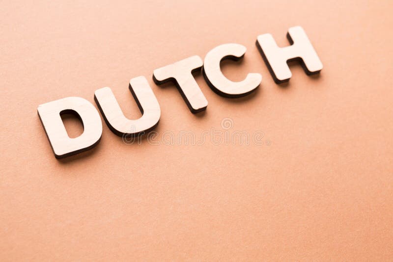 Word Dutch on beige background royalty free stock photography Word Dutch on beige background royalty free stock photography
