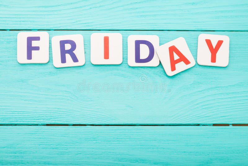 Word Friday Letters on Blue Wooden Background. Black Friday Sales. Top ...