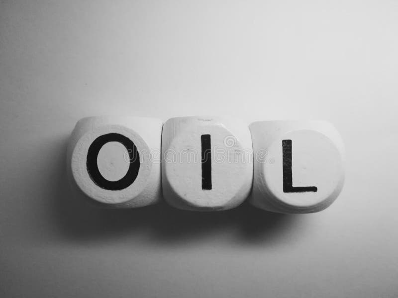 Word gespelde de olie dobbelt stock afbeelding Word gespelde de olie dobbelt stock afbeelding