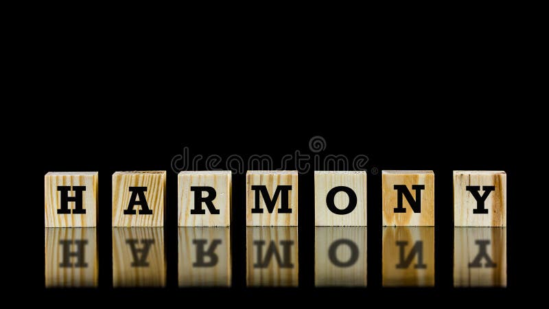 The word - Harmony - on wooden cubes stock photography