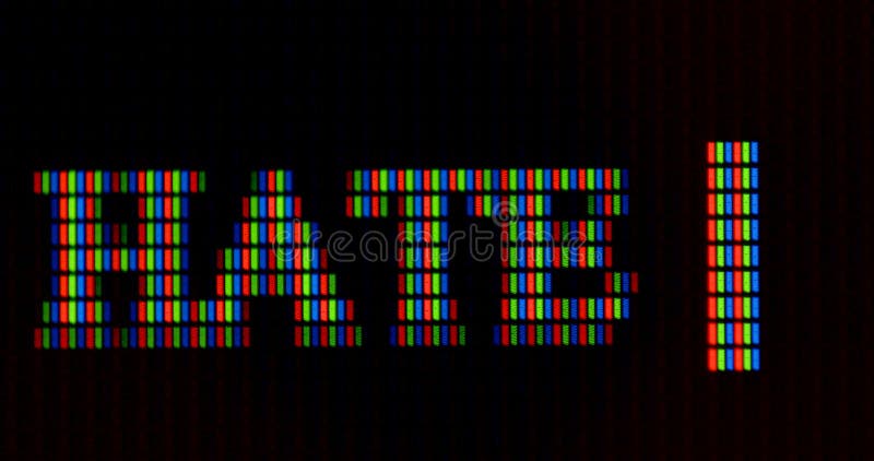 The word hate is written in pixel letters on the monitor. RGB font rendering