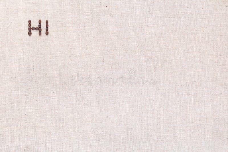 The word Hi written with coffee beans shot from above, aligned at the top right stock image The word Hi written with coffee beans shot from above, aligned at the top right stock image