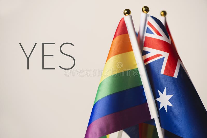 Word ja en de vlaggen van Australiër en van de regenboog stock fotografie Word ja en de vlaggen van Australiër en van de regenboog stock fotografie
