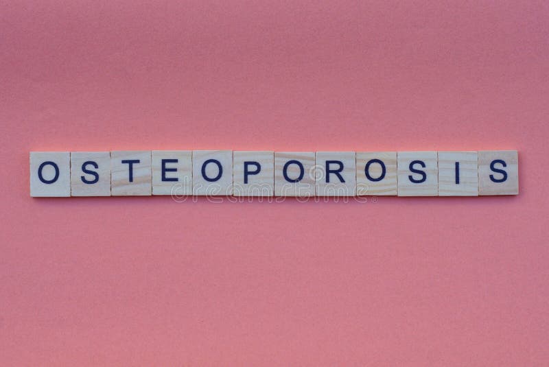 Word osteoporosis from small gray wooden letters lies on a red background