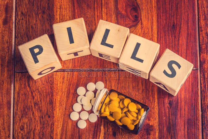 The word pills on a table stock image. Image of conceptual 67957439