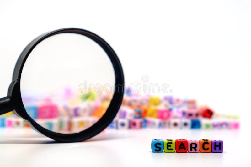 Word `SEARCH` on the magnifying glass with alphabet letter beads background, Search engine optimization concept