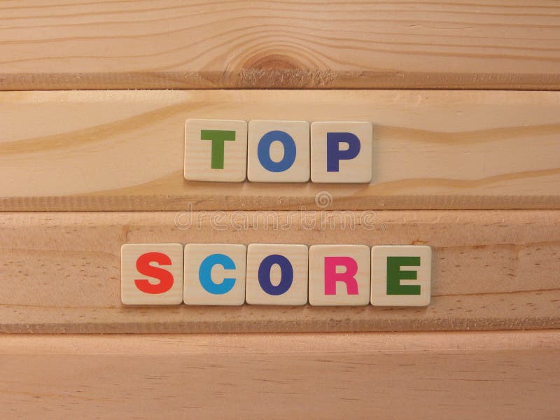 Score Word Written on Wood Block. Score Text on Table, Concept Stock