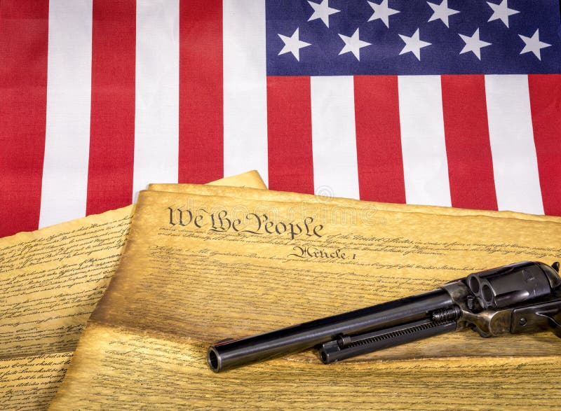 Words of the American Constitution and Pistol Stock Photo Image of