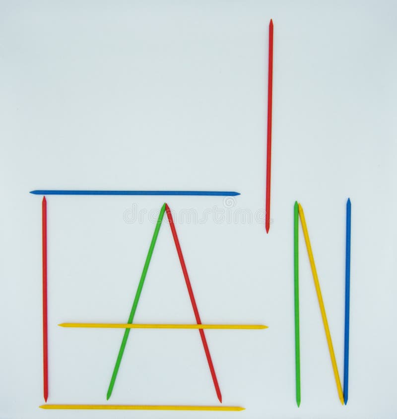 The words: I can, written whith colored shangai sticks, positiveness concept royalty free stock photography The words: I can, written whith colored shangai sticks, positiveness concept royalty free stock photography