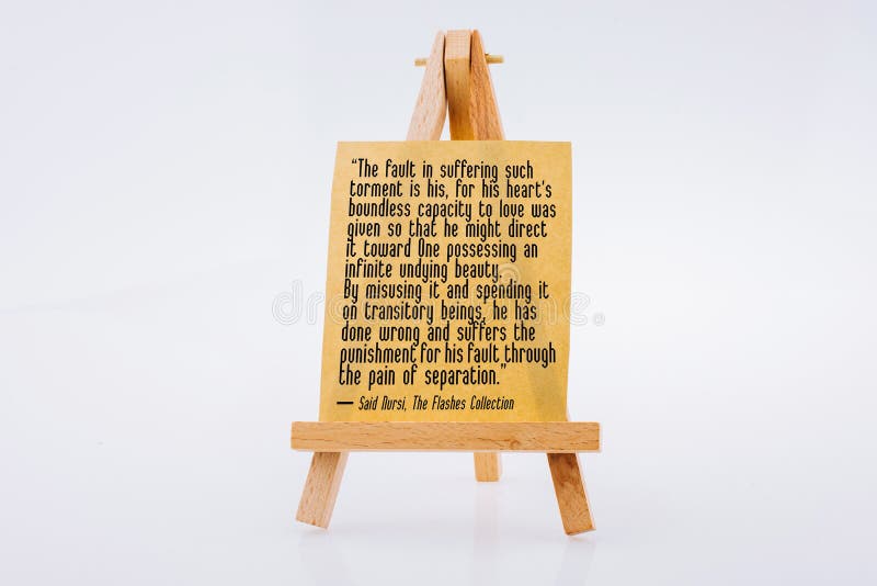 Words about real divine love written on Brown notepaper on a painting tripod royalty free stock images Words about real divine love written on Brown notepaper on a painting tripod royalty free stock images
