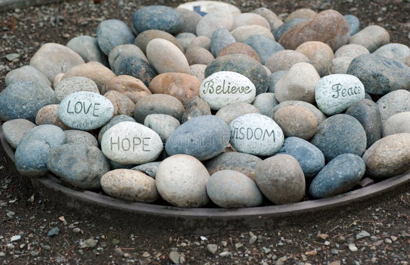 Words of wisdom in a plate of rocks