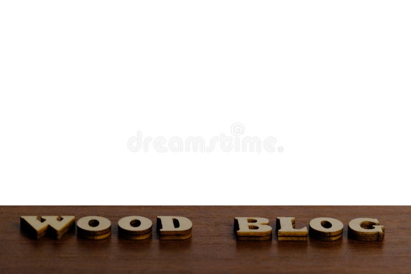 The words WOOD BLOG are made of wooden letters on a background of dark brown wood. Free white space on top for an inscription or l stock photo The words WOOD BLOG are made of wooden letters on a background of dark brown wood. Free white space on top for an inscription or l stock photo