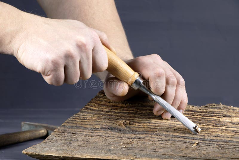 Carpenter. Work of Carpenter. Handyman with Tools.Assortment of Chisel
