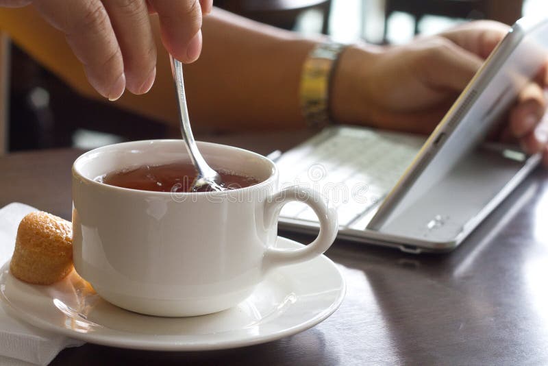 Work and a cup of tea stock photo. Image of adult, coffee 30409350