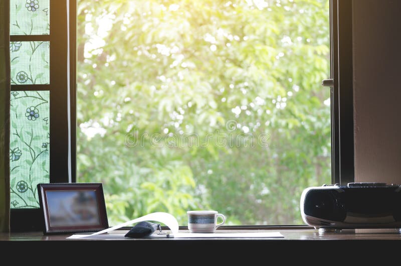 A Work Desk with a Natural Atmosphere Outside the Window with the