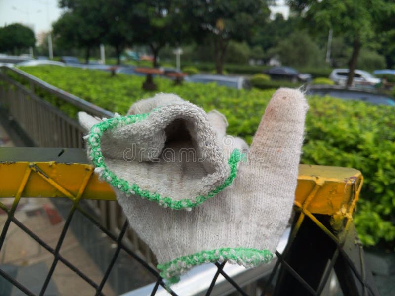 A pair of working gloves were placed at the labor scene. Pair working gloves stock images, royalty-free photos and pictures