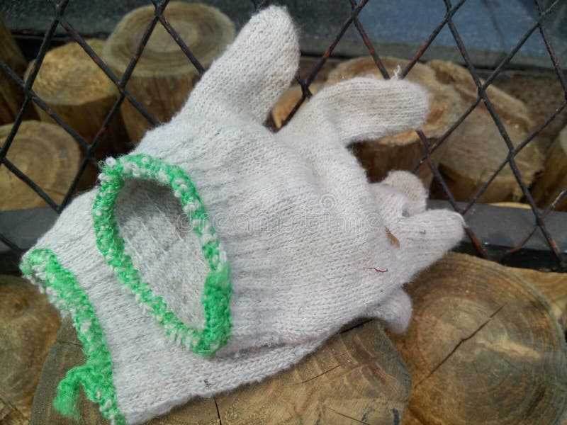 A pair of working gloves were placed at the labor scene. Pair working gloves stock images, royalty-free photos and pictures