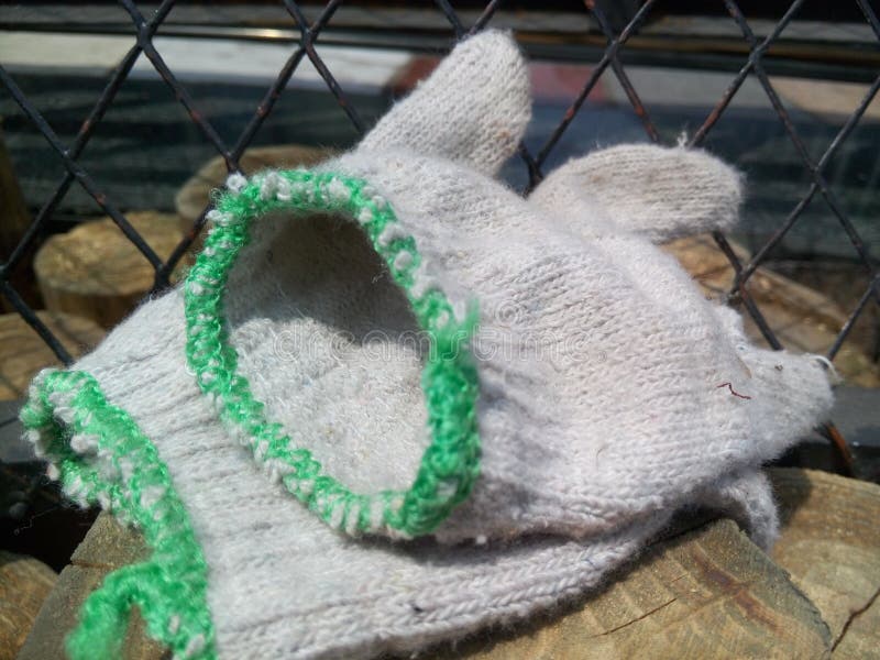 A pair of working gloves were placed at the labor scene. Pair working gloves stock images, royalty-free photos and pictures