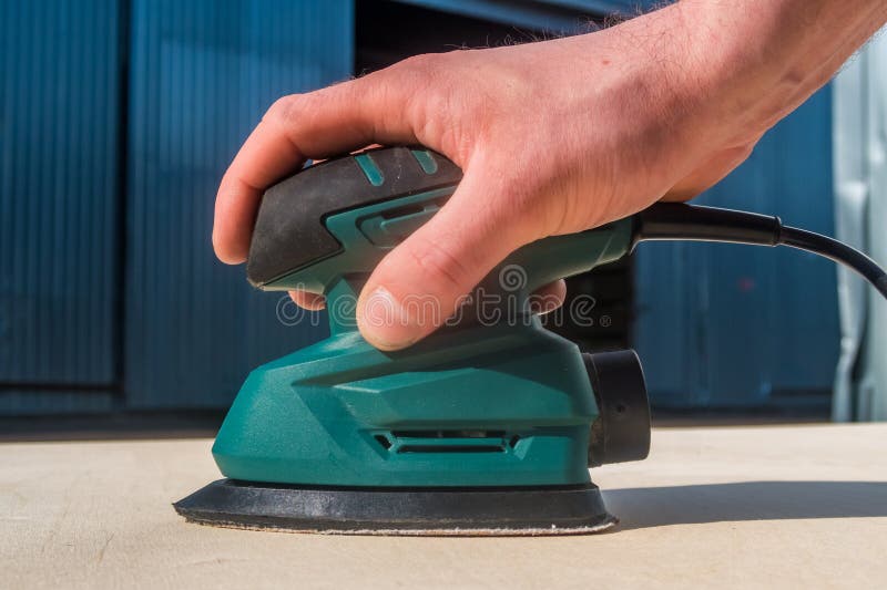 The work of the grinder stock photo. Image of hand, grinder 275795122