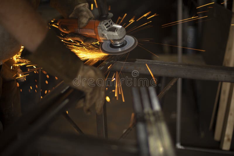 Work Grinding Machine. Sparks from the Force of Friction Stock Photo