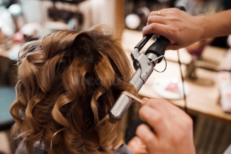 The Work of a Hairdresser. the Master Does Styling Hair and Curling with  Tongs. Close-up of Hands and Tool. Stock Image - Image of client, salon:  189686265