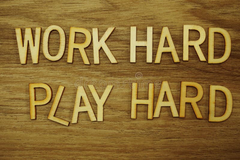 Work Hard Play Hard Alphabet Letters on Wooden Background Business ...