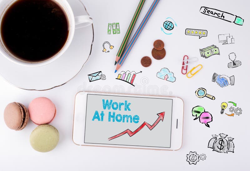 Work At Home, Business Concept. Mobile phone and coffee cup on a white office desk royalty free stock photos