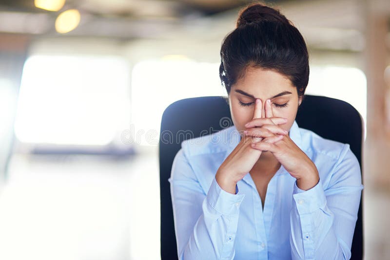 When Work Just Becomes Too Mucha Young Businesswoman Looking Stressed While Sitting In Her