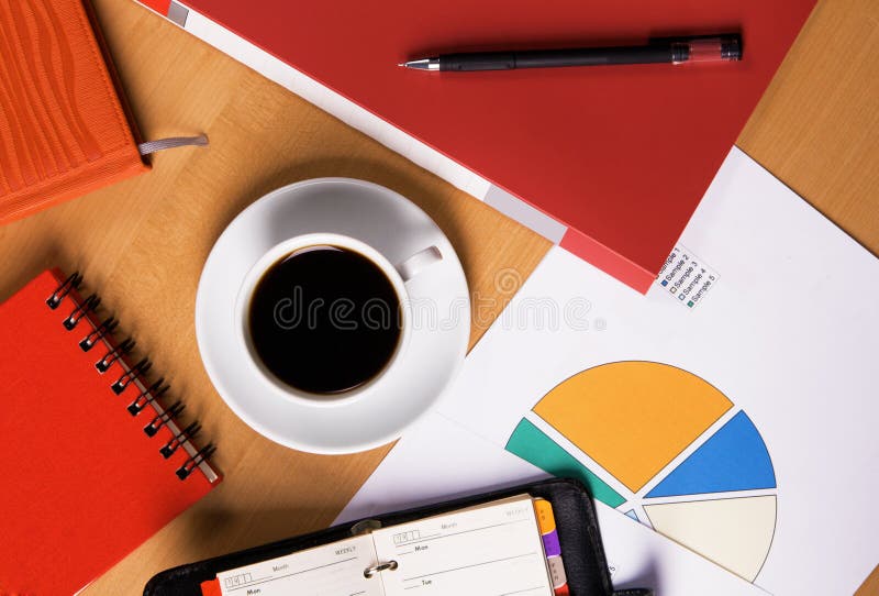 Work-table covered with documents